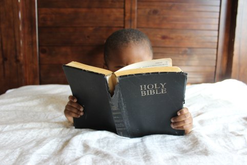 Child with Bible by Samantha Sophia-34200-unsplash