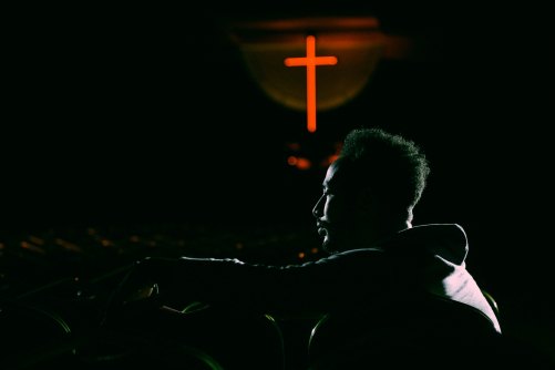 Man and Cross by Gift Habeshaw-449311-unsplash